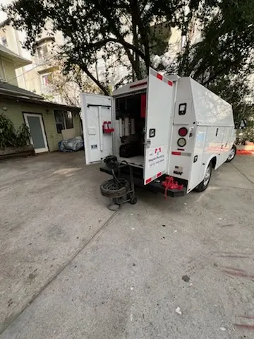 Magnet Plumbing service vehicle on-site for Grease Trap Cleaning in Citrus
